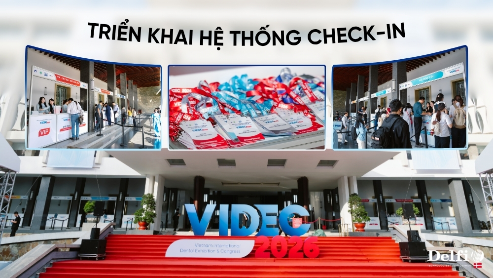 Khu vực check-in hội nghị VIDEC 2026 với hệ thống thiết bị do Delfi triển khai.
