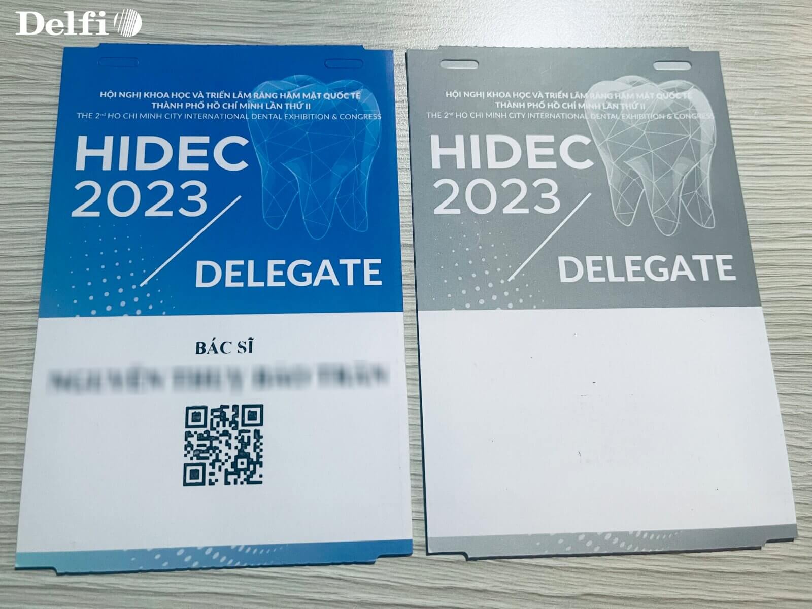 Thẻ đại biểu HIDEC 2023 đang hiển thị mã QR check-in và thông tin khách tham dự